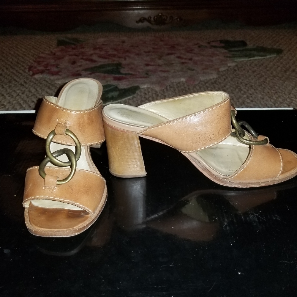 Hugo Buscati mules with metal ring detail